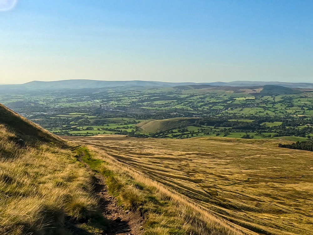 Descending off Pendle Hill heading back towards Downham