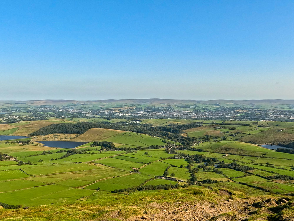 Looking down towards Hookcliffe plantation and Downham from Pendle Hill