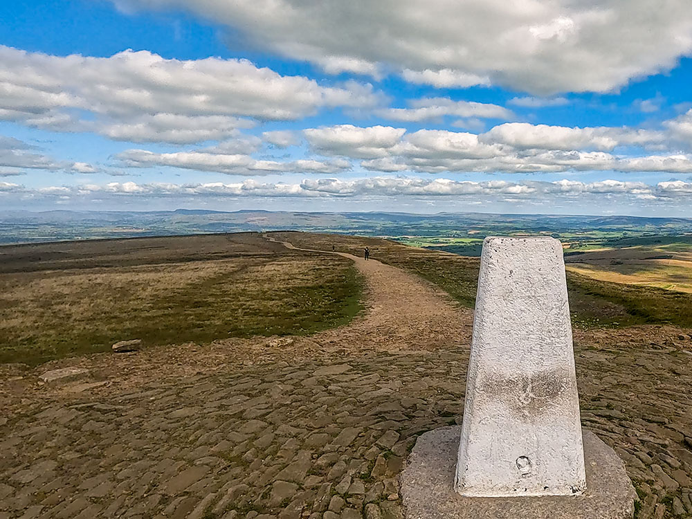 Pen-y-ghent and Ingleborough from the trig point on the summit of Pendle Hill