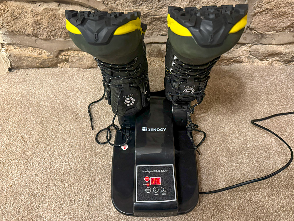 Hiking boots on an electric boot dryer