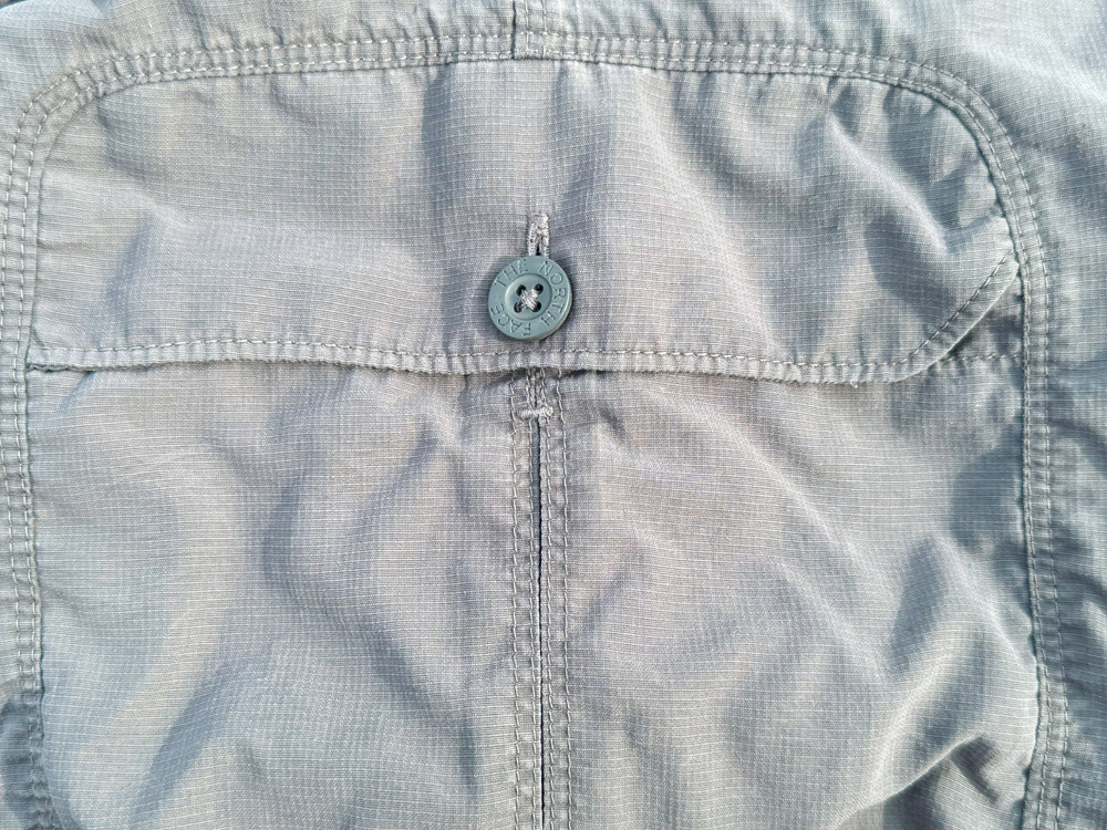 Buttoned-down cargo pocket on hiking shorts
