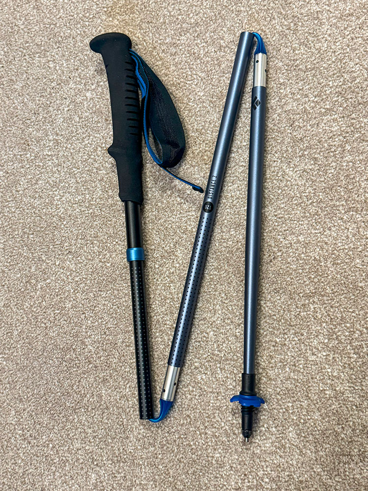 A collapsed aluminium fixed-length hiking pole