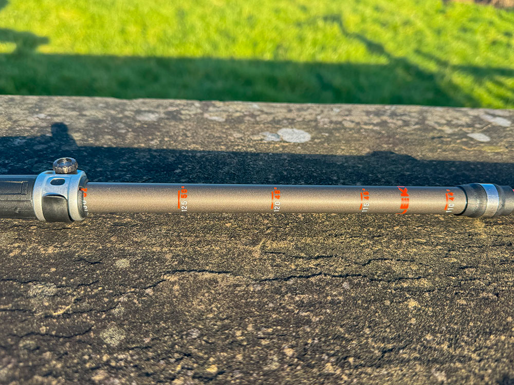 Markers showing the various lengths of pole between 110cm an 130cm on a trekking pole