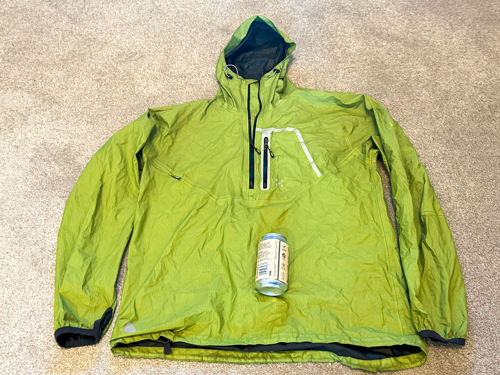 Waterproof jacket compared to the size of the can it packs down to when stuffed into the jacket pocket