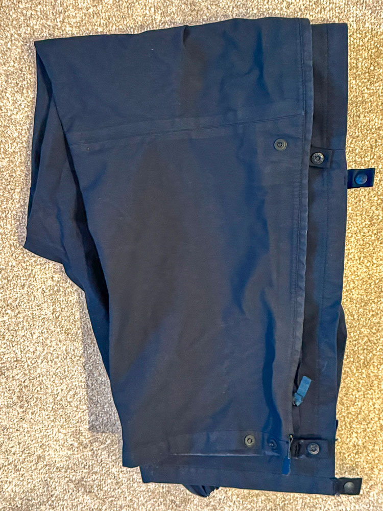 Waterproof trousers folded in half