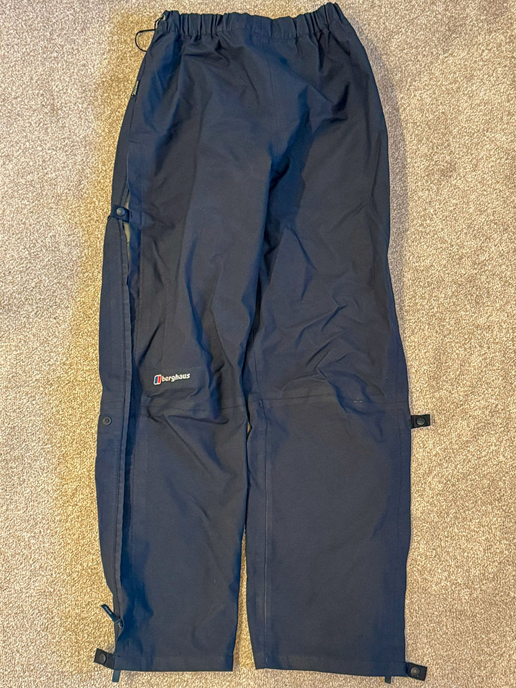 Waterproof trousers laid flat on the floor