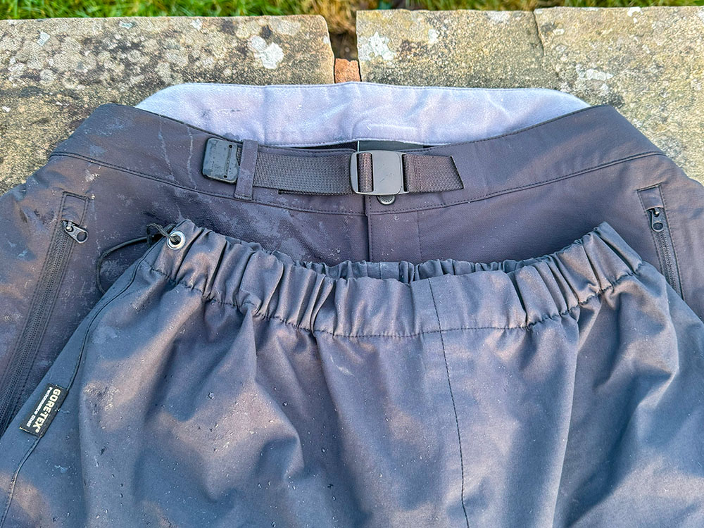 The different waist fastenings on waterproof and water-resistant trousers