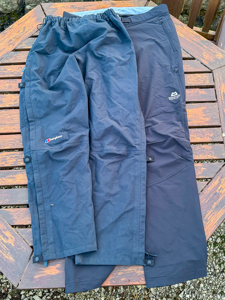 Waterproof and water-resistant trousers side-by-side