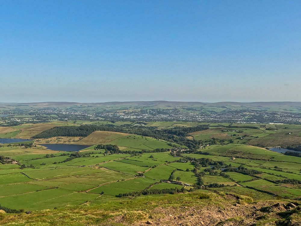 Looking down towards the Black Moss reservoirs, Barley and Lower Ogden Reservoir from the side of Pendle Hill