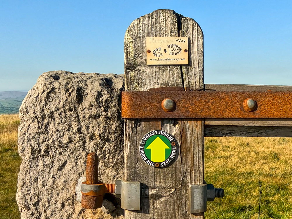 Signs on the gate indicate that this part of the path forms part of the Lancashire Way and the Ribble Valley Jubilee Trail