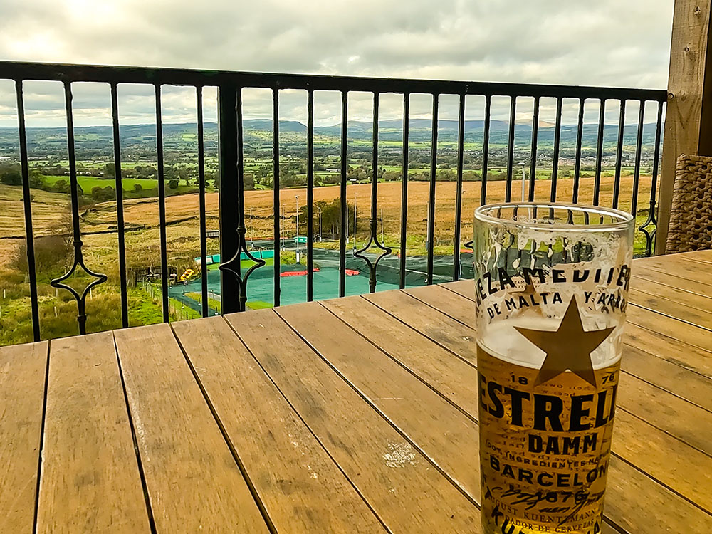 Enjoying a drink looking out across the Ribble Valley from the covered balcony at the Wellsprings