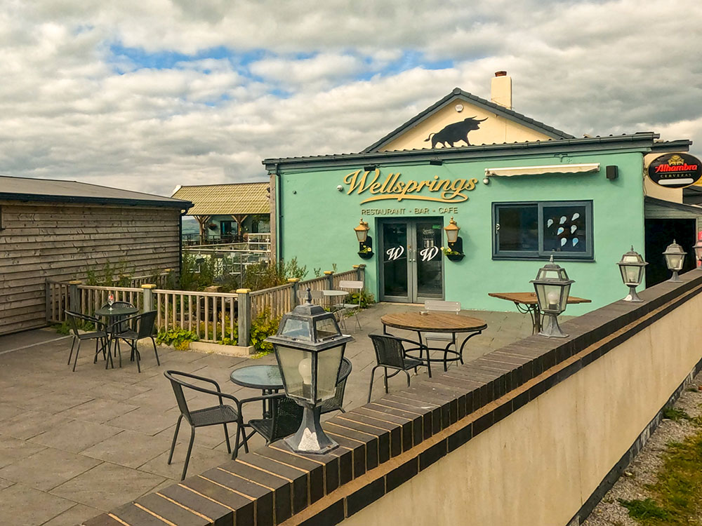 Entrance to the Wellsprings restaurant, bar and café