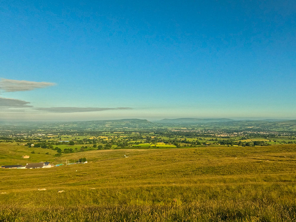 Looking back towards Blackpool on the horizon, the Wellsprings below, Longridge Fell, Walker Fell and round towards Clitheroe and over the Ribble Valley