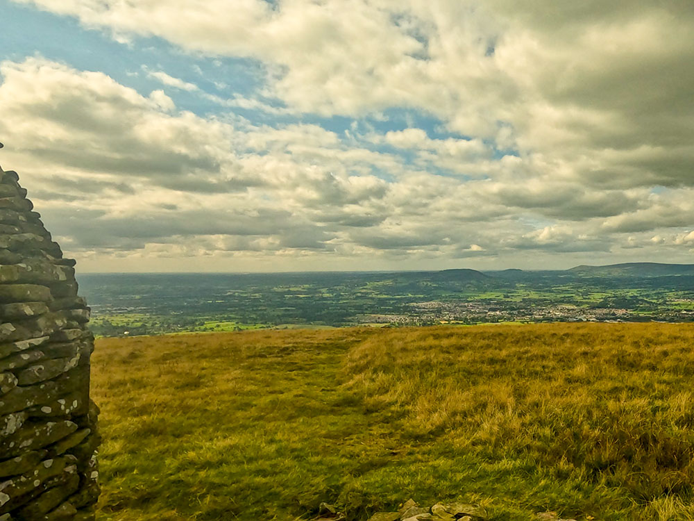 Looking towards Longridge Fell, Clitheroe and the Ribble Valley from the Scout Cairn on Pendle Hill