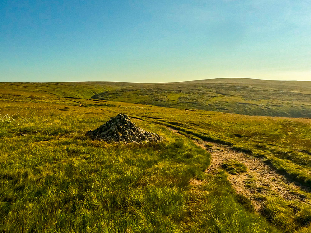 Passing a cairn as the path heads towards Ogden Clough