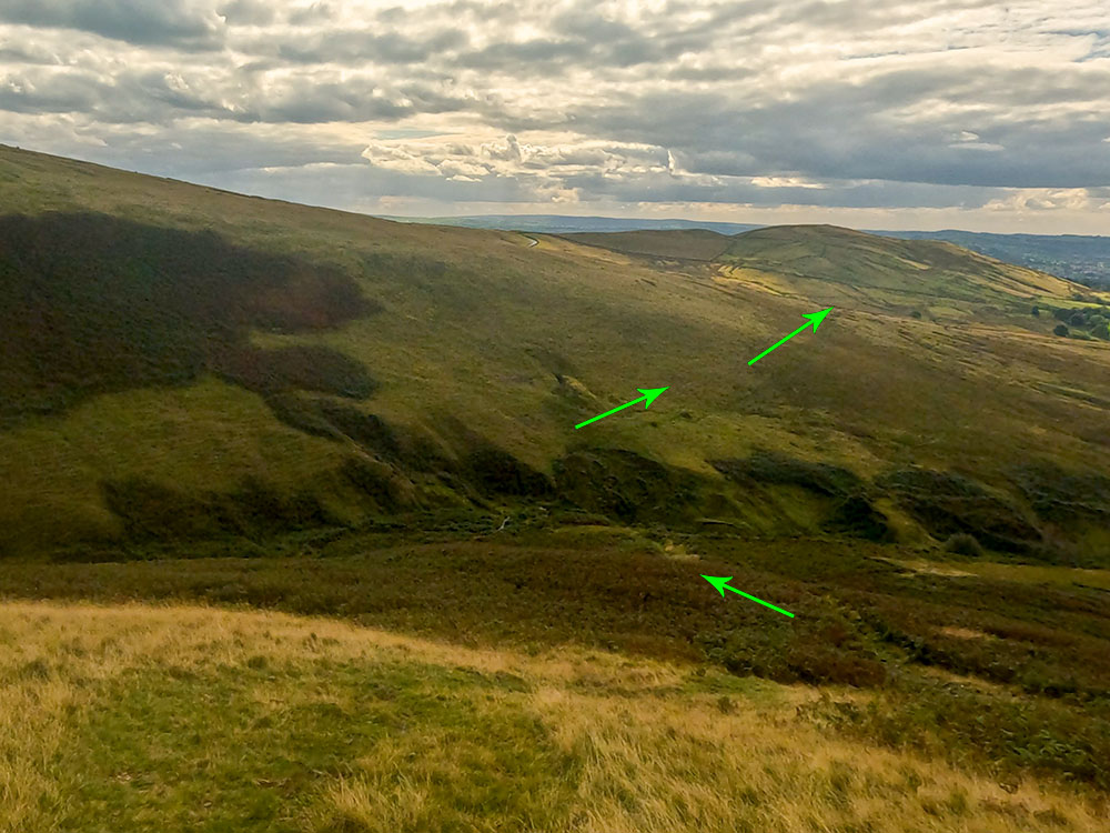 The path heads down towards Howcroft Brook below, with the onward path visible on the far side