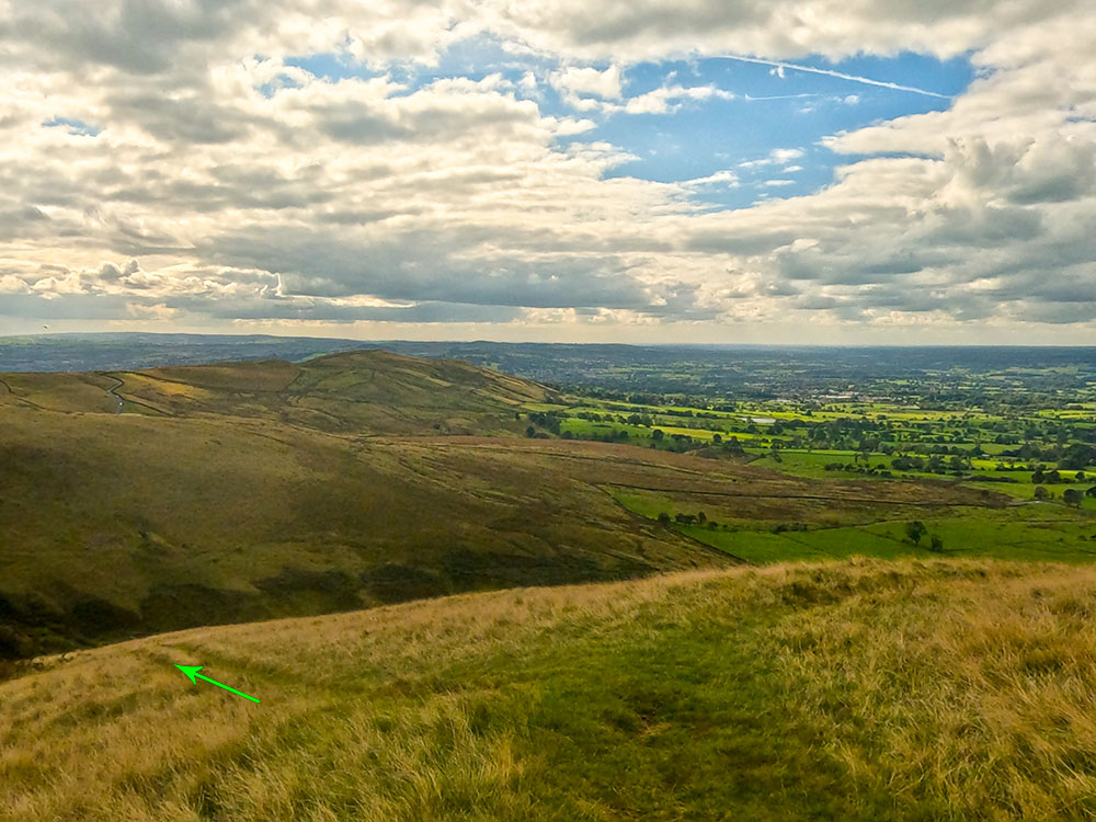 As the main path swings around to the right, we head left off this path to descend more steeply